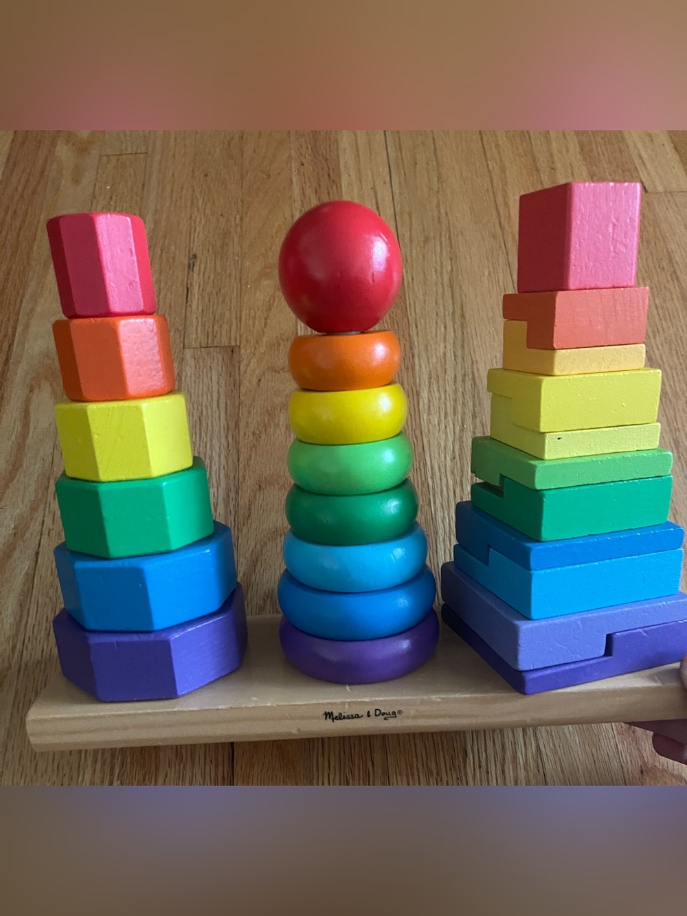 Melissa & Doug Geometric Stacker Wooden Educational Toy